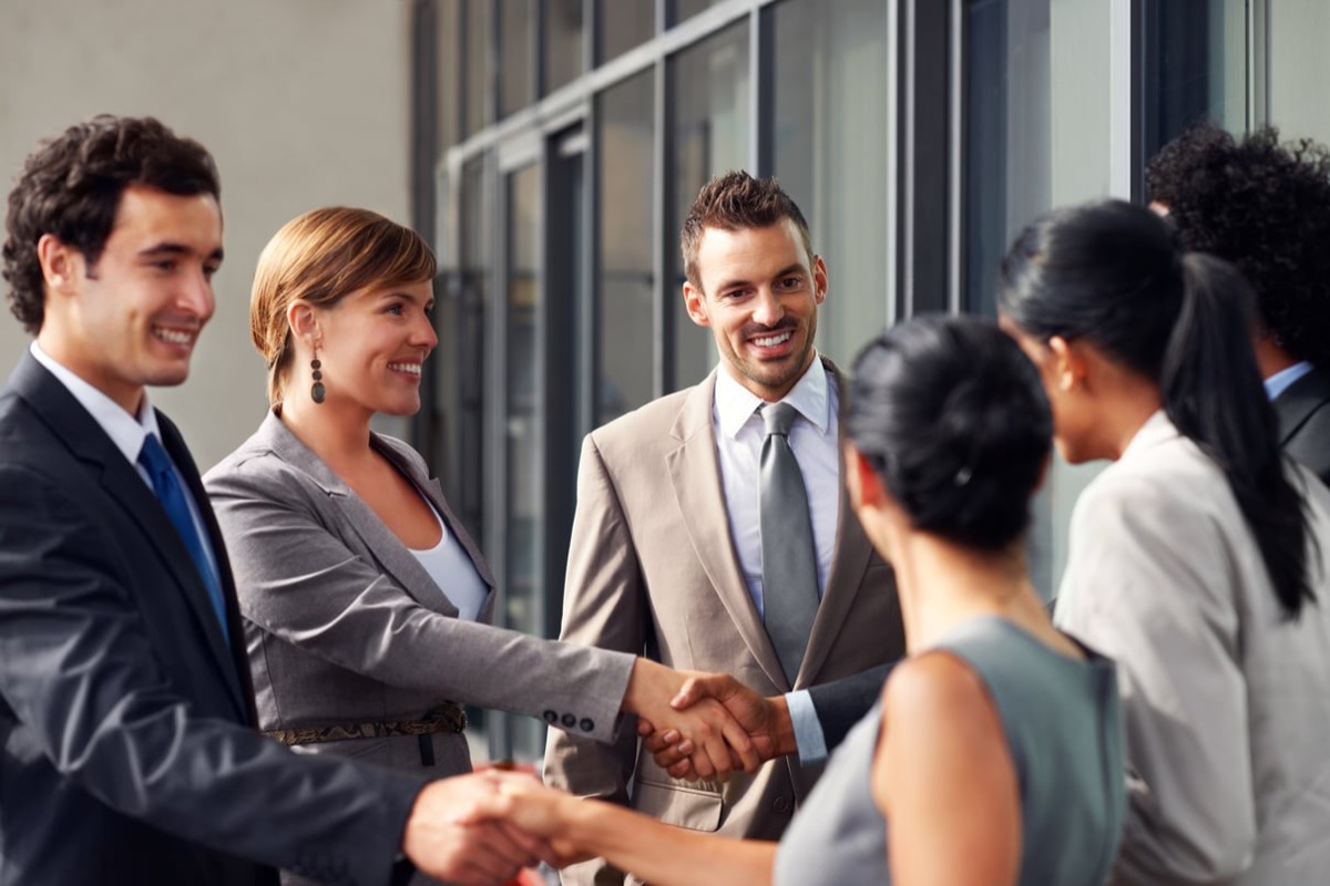 Business partners shaking hands